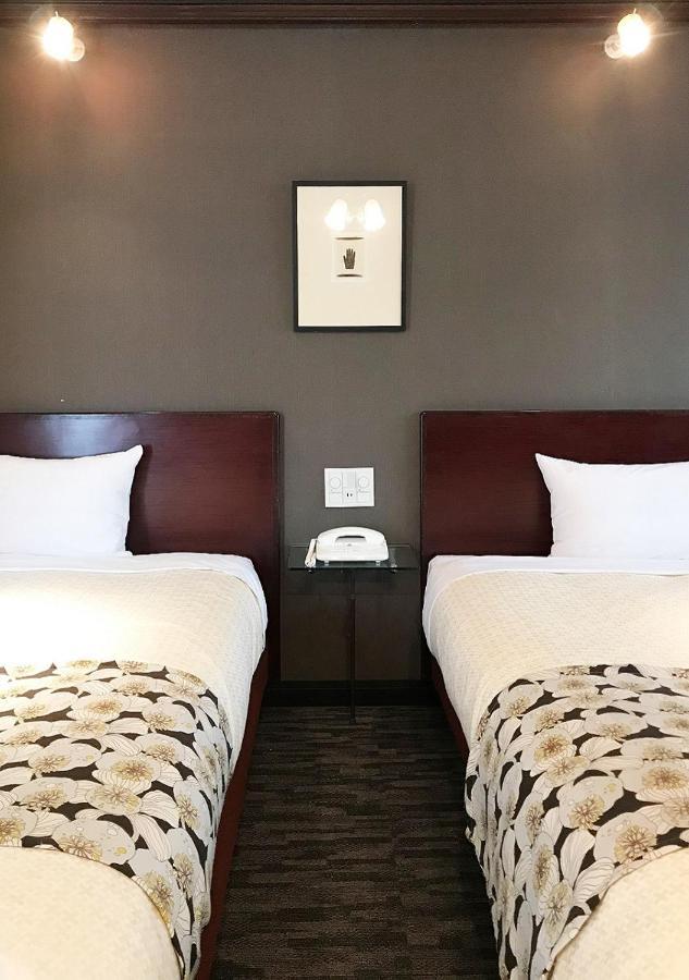 Hotel Okus Кумамото Номер фото